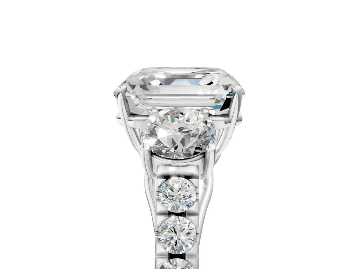 Asscher Cut Cut Diamond Three-Stone Ring with Round Side Stones and Pavé Band Platinum