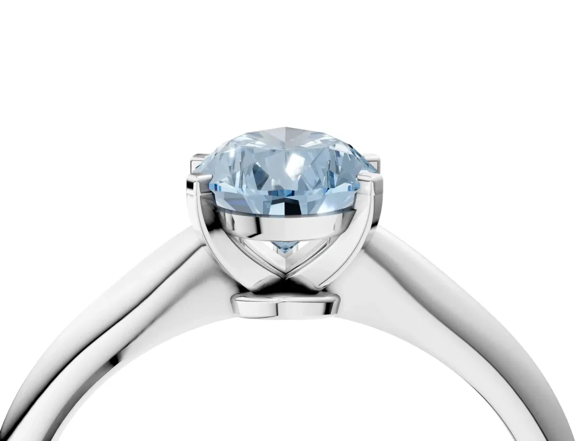 Fancy Blue Pear Cut Diamond Solitaire Engagement Ring with Classic Band and Four-Prong Setting Silver