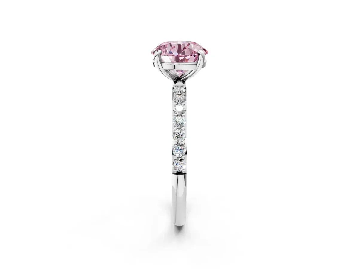 Fancy Pink Round Cut Diamond Solitaire Ring with Round Pavé Band and Prong Setting Silver