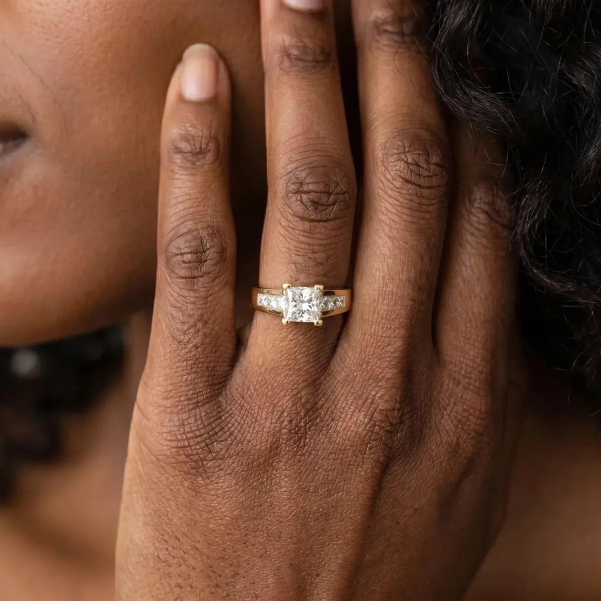 Radiant Cut Cut Channel Set Solitaire Ring with Four-Prong Setting Yellow gold