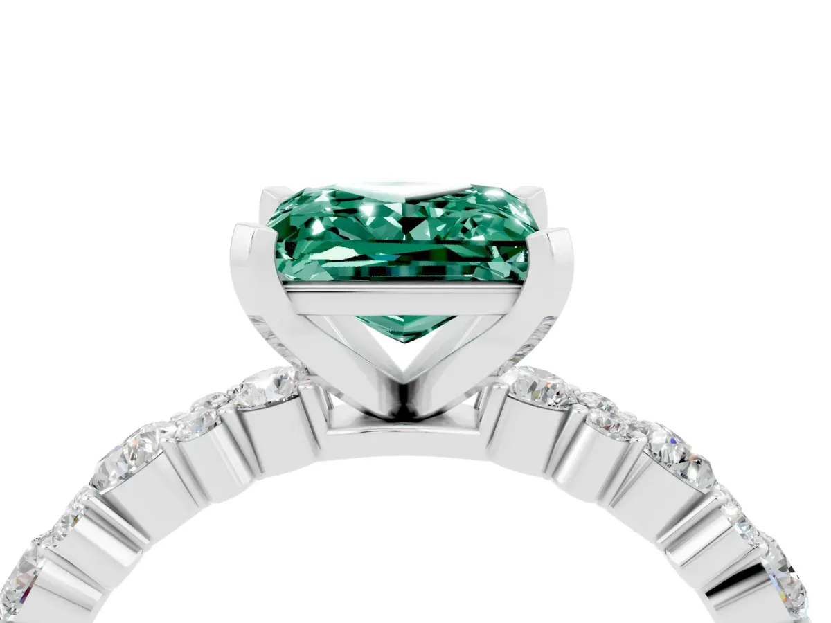 Princess Cut Green Sapphire Side Stone Solitaire Ring with Round and Four-Prong Setting Platinum