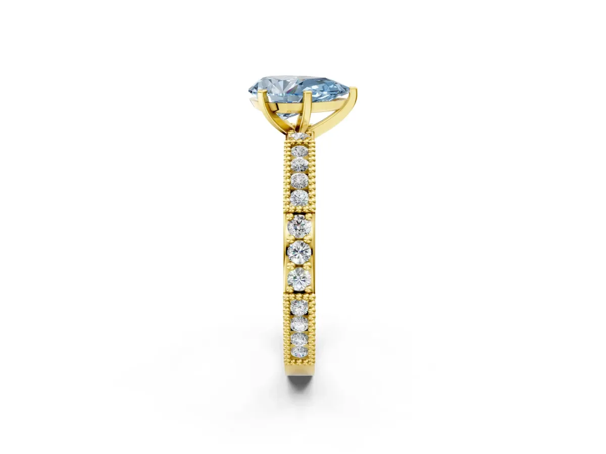 Fancy Blue Pear Cut Solitaire with Pavé Band and Four-Prong Setting Yellow gold