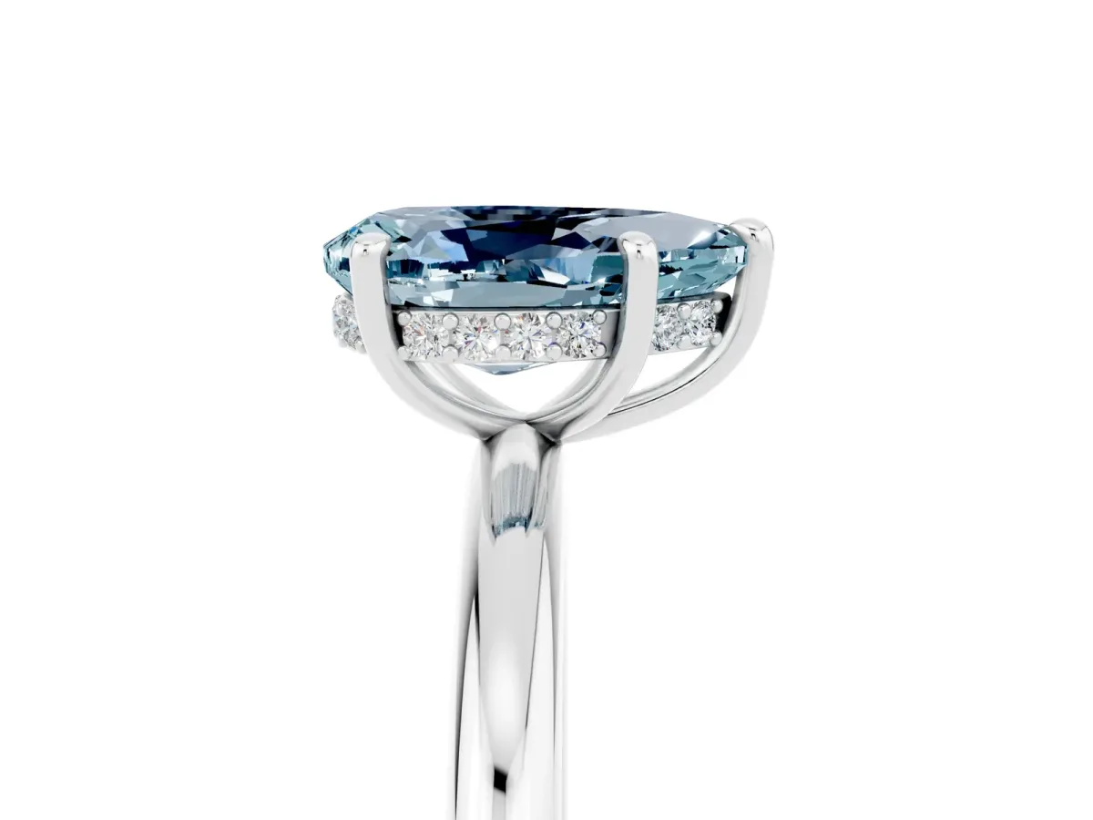 Pear Cut Aquamarine Solitaire Ring with Thin Band and Four-Prong Setting Silver