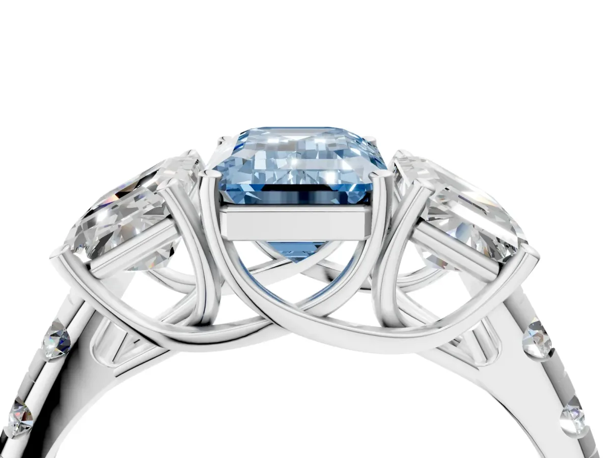 Fancy Blue Three-Stone Emerald Cut Diamond Pavé Band with Prong Setting Platinum