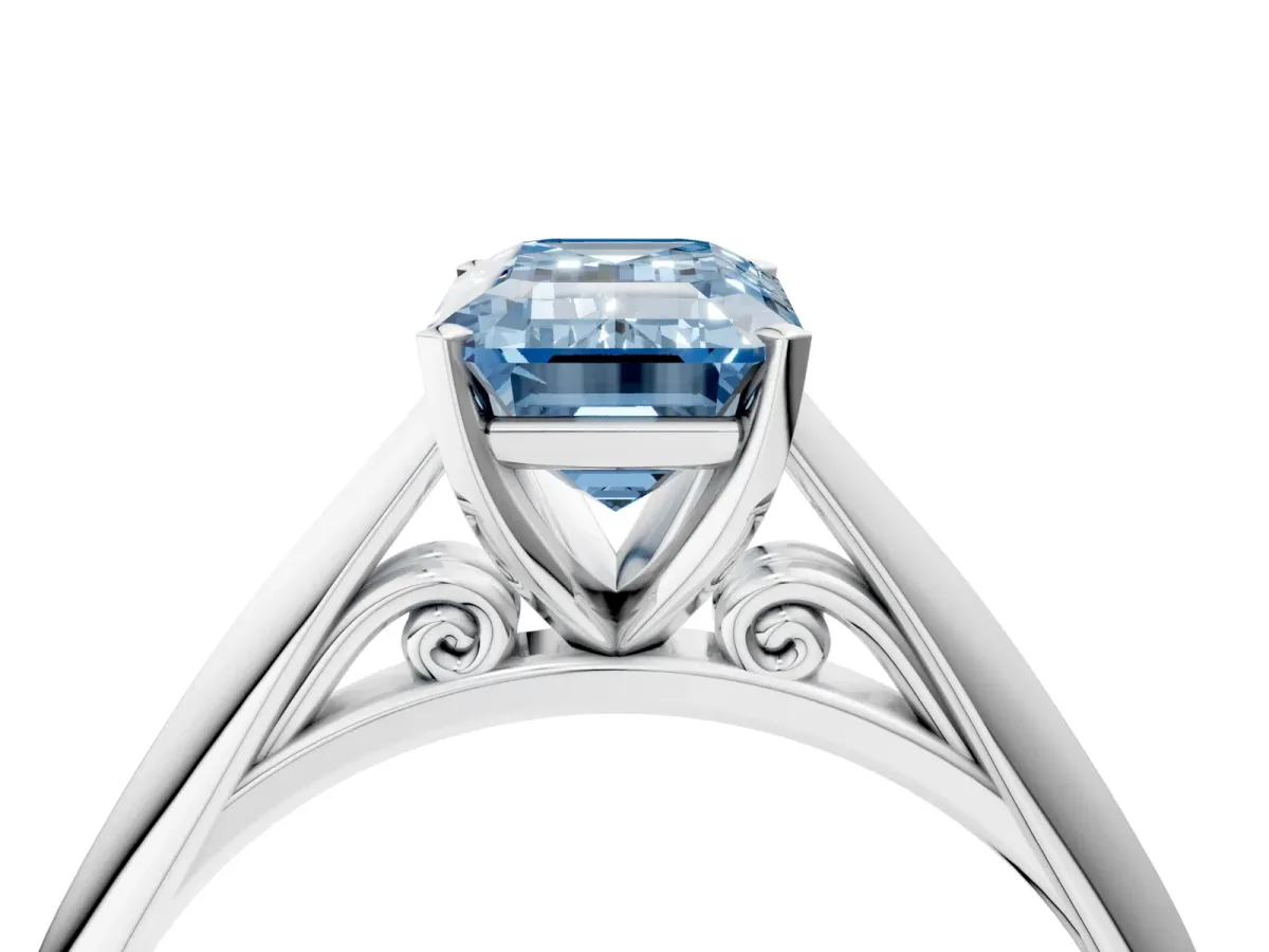 Fancy Blue Emerald Cut Diamond Solitaire Engagement Ring with Cathedral Setting and Four-Prong Mount White gold