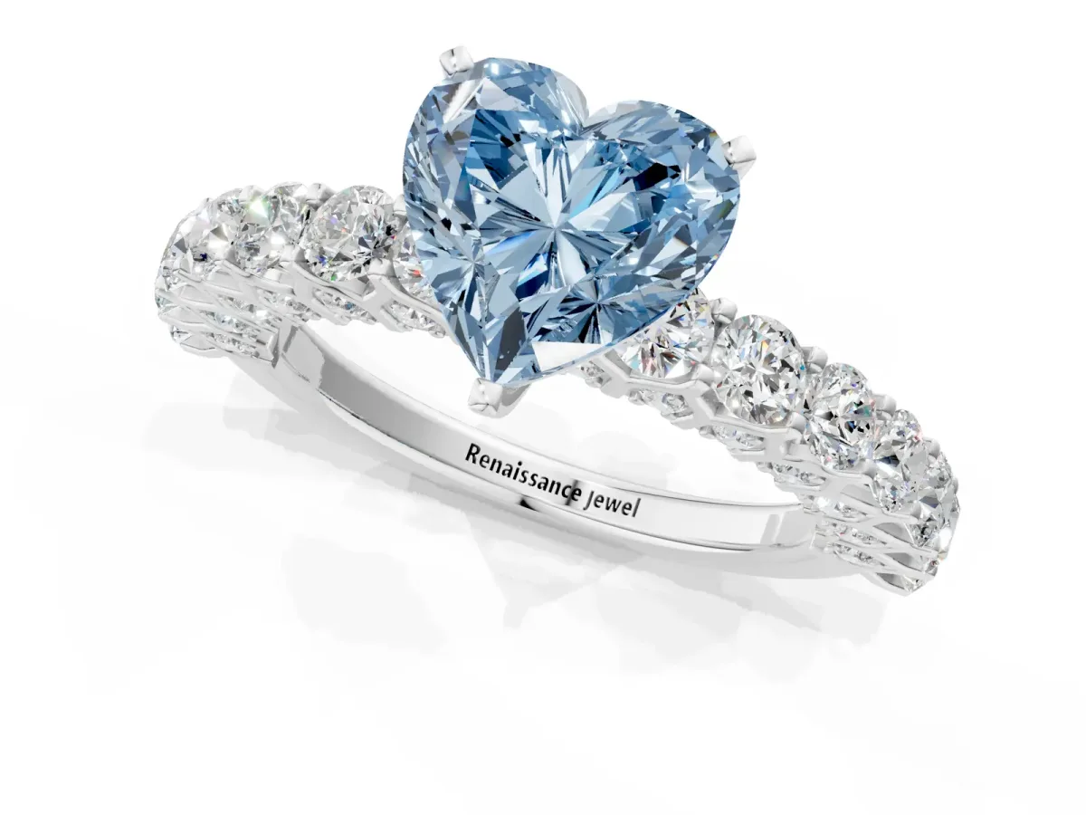 Fancy Blue Heart Cut Diamond Solitaire Ring with Shared Prong Pavé Band and Four-Prong Setting Platinum
