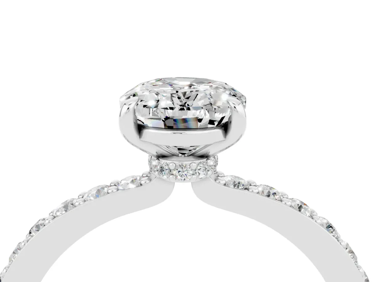 Oval Cut Moissanite Solitaire Engagement Ring with Pavé Band and Four-Prong Setting Silver