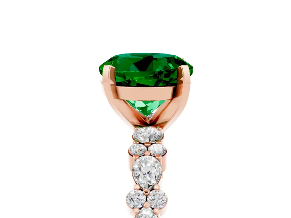 Round Cut Emerald Side Stone Solitaire Ring with Round and Four-Prong Setting Rose gold
