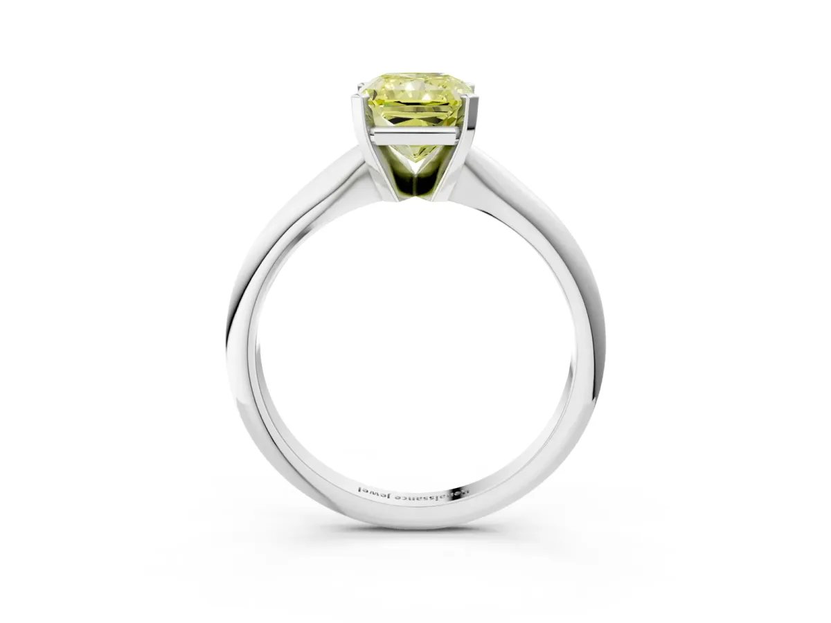 Fancy Yellow Radiant Cut Cut Solitaire Ring with Four-Prong Setting on a Classic Band Platinum