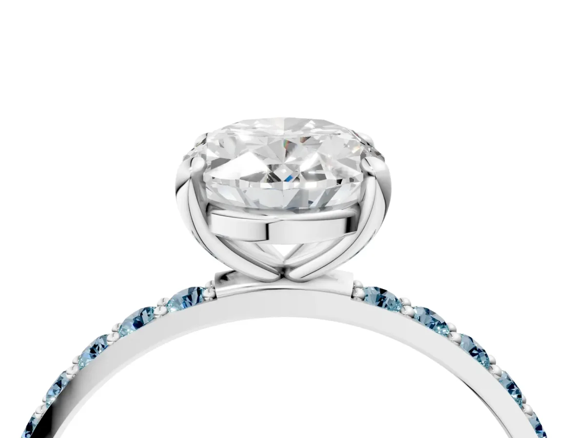 Oval Cut Diamond Solitaire Ring with Round Aquamarine Pavé Band and Prong Setting Silver
