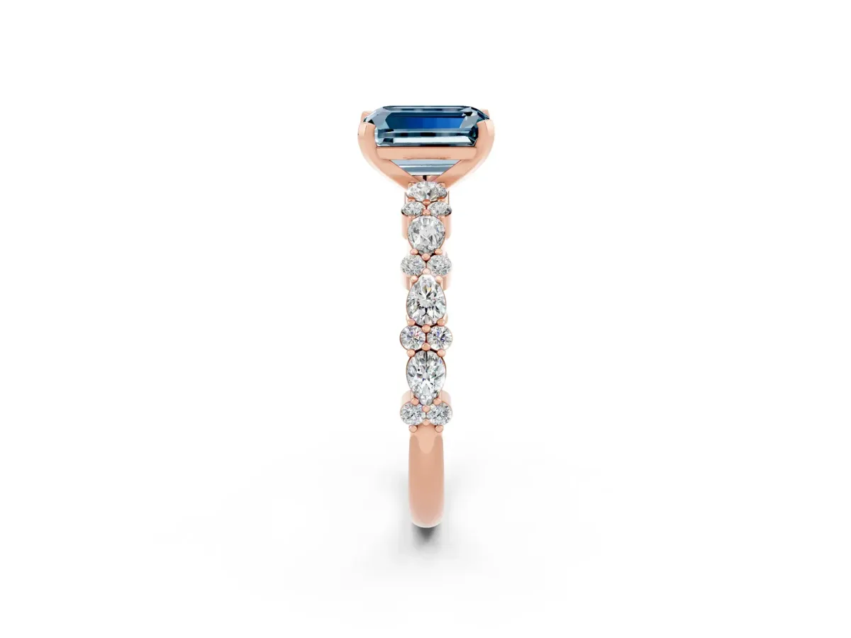 Emerald Cut Aquamarine Side Stone Solitaire Ring with Round and Four-Prong Setting Rose gold