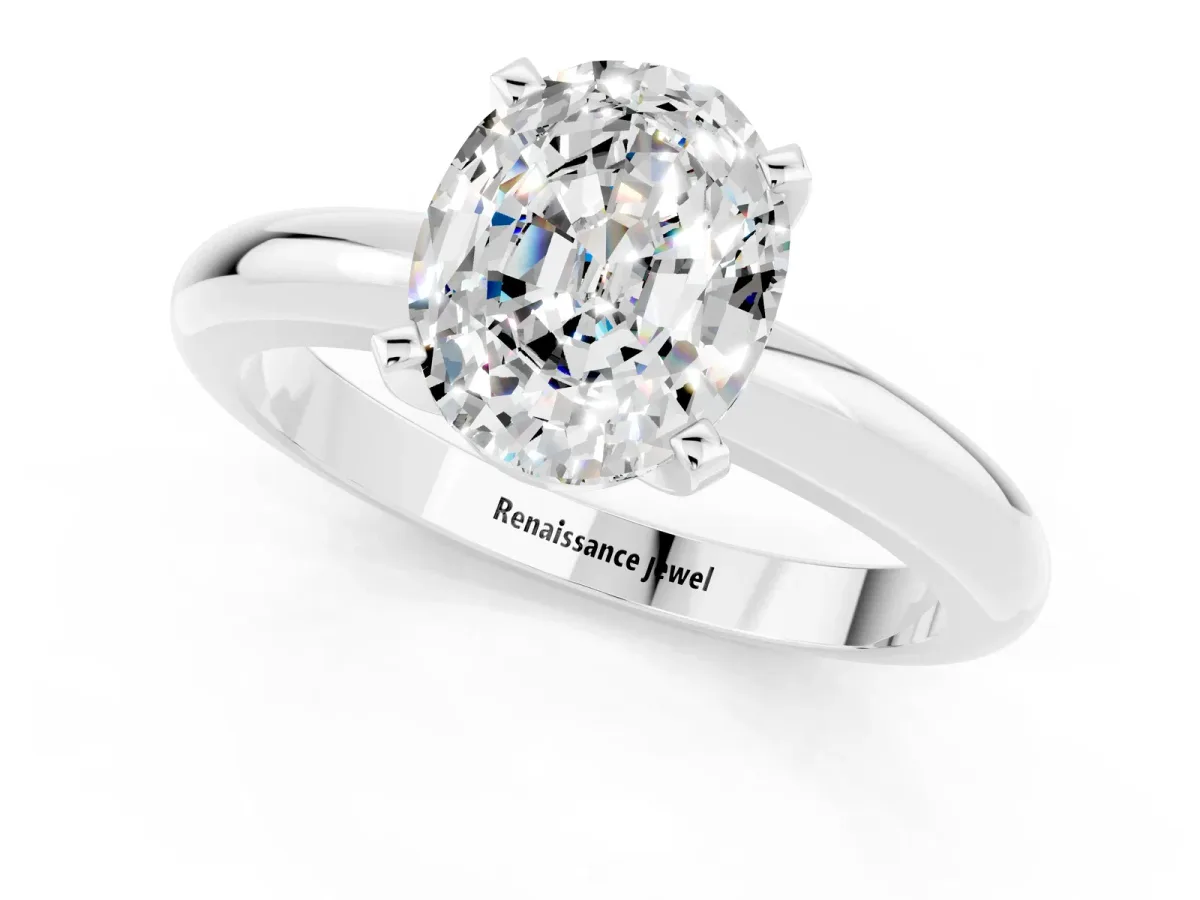 Oval Cut Moissanite Solitaire Engagement Ring with Round Band and Four-Prong Setting Silver