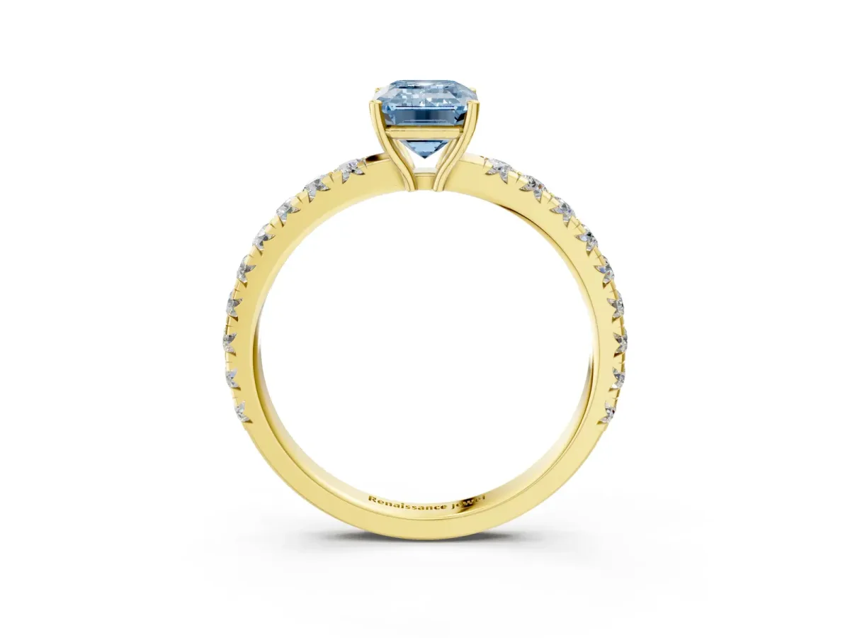 Fancy Blue Emerald Cut Diamond Pavé Solitaire Engagement Ring with Four-Prong Setting Yellow gold
