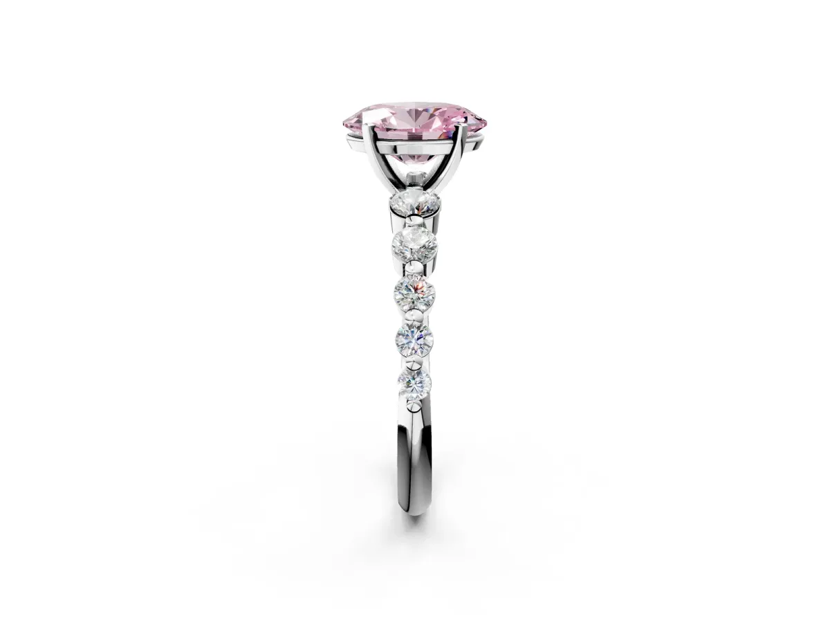 Fancy Pink Oval Cut Solitaire Diamond Ring with Pave Band and Four-Prong Setting Silver
