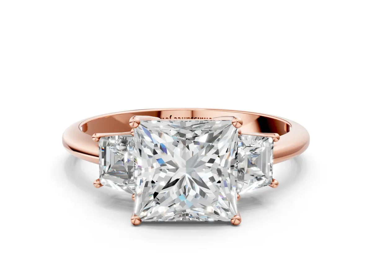 Princess Cut Diamond Three-Stone Ring with Trapezoid Side Stones and Prong Setting Rose gold