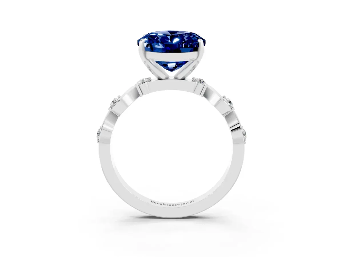 Oval Cut Blue Sapphire Solitaire Twisted Band with Round Accents and Prong Setting Silver