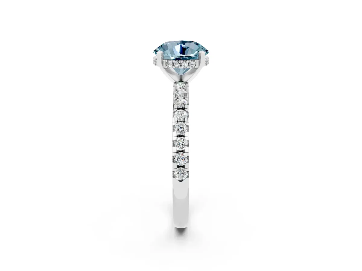 Round Cut Aquamarine Solitaire Ring with Round Pavé Band and Four-Prong Setting Silver