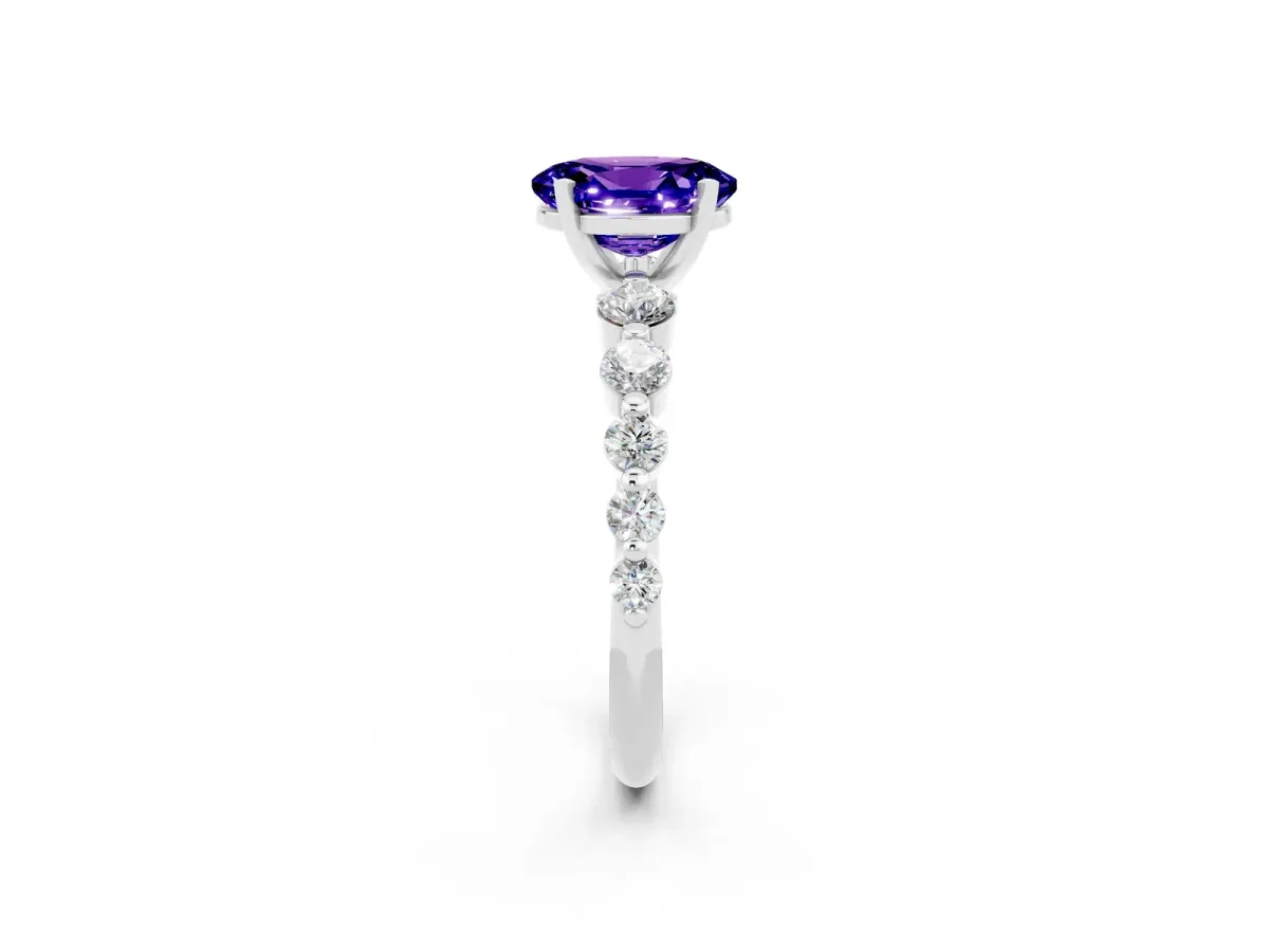 Oval Cut Solitaire Tanzanite Ring with Pave Band and Four-Prong Setting Silver