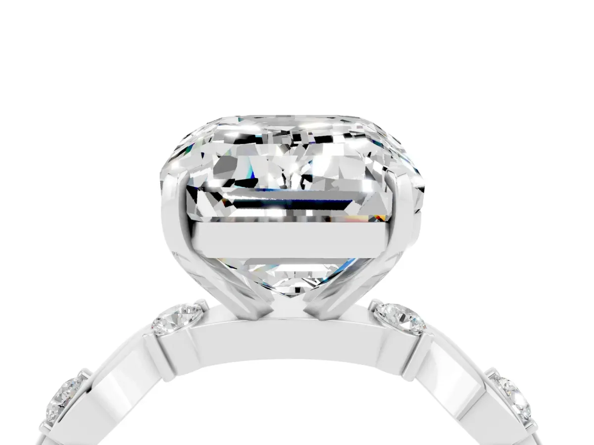 Emerald Cut Moissanite Solitaire Twisted Band with Round Accents and Prong Setting Silver