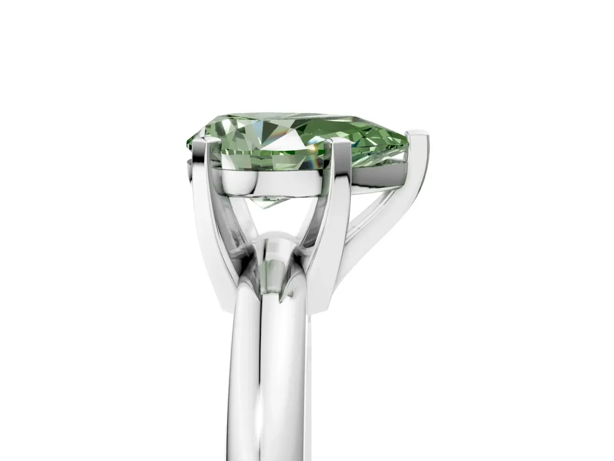 Fancy Green Pear Cut Diamond Solitaire Engagement Ring with Round Band and Four-Prong Setting Silver