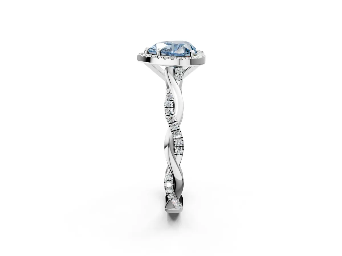 Fancy Blue Heart Cut Cut Halo Twisted Band Four-Prong Ring Platinum