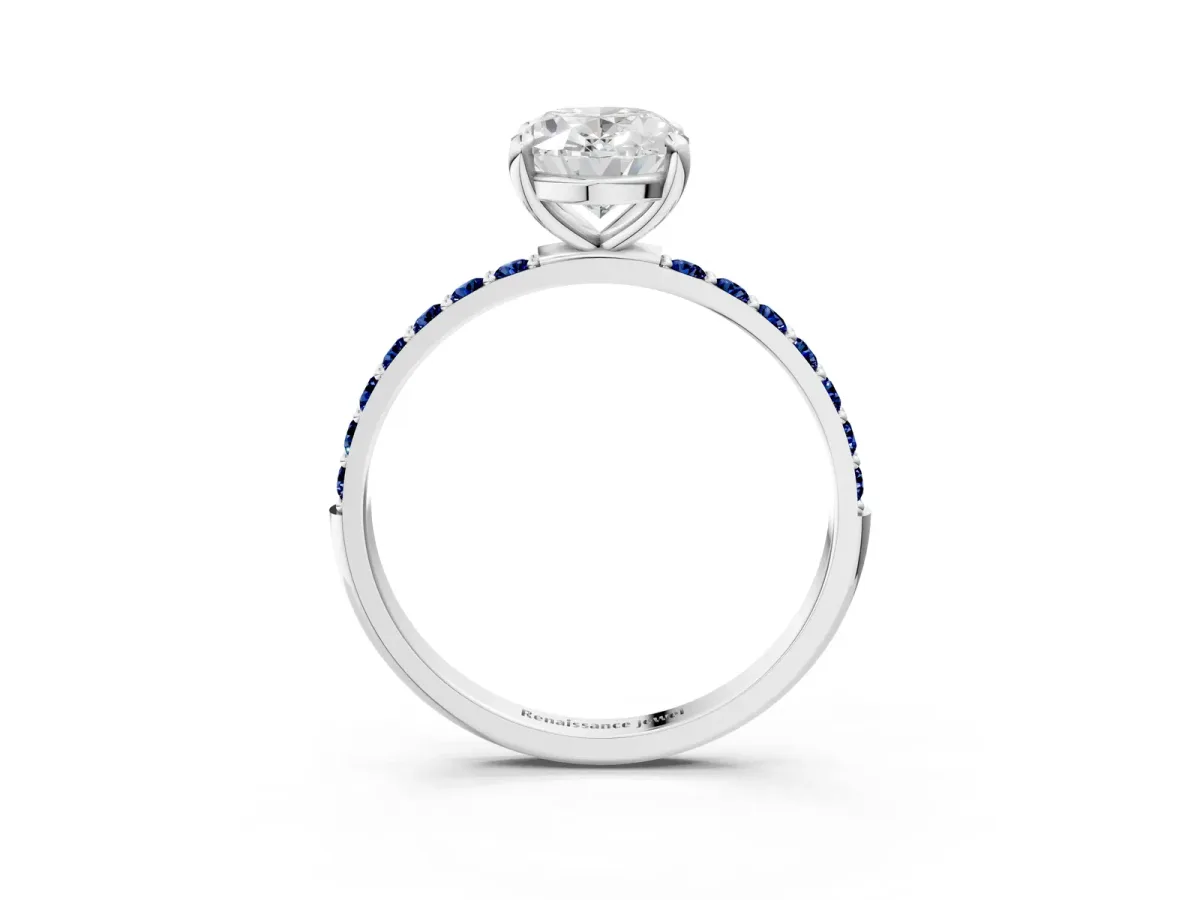 Oval Cut Diamond Solitaire Ring with Round Blue Sapphire Pavé Band and Prong Setting Silver