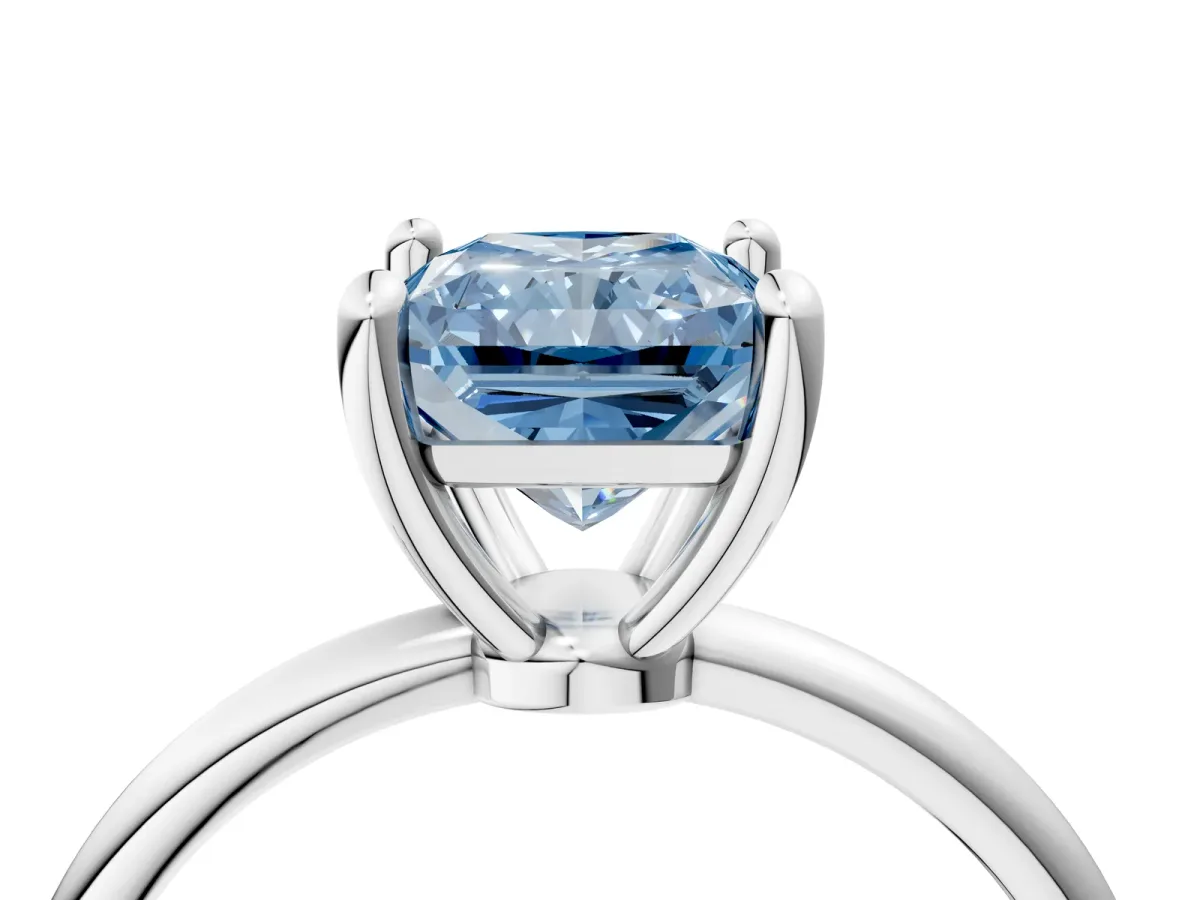 Fancy Blue Radiant Cut Solitaire Diamond Ring with 4-Prong Setting on a Classic Band White gold
