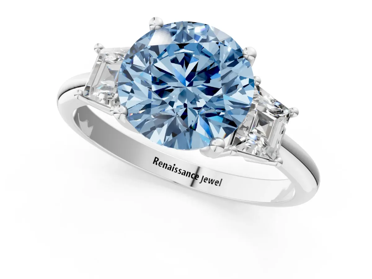 Fancy Blue Round Cut Diamond Three-Stone Ring with Trapezoid Side Stones and Prong Setting White gold