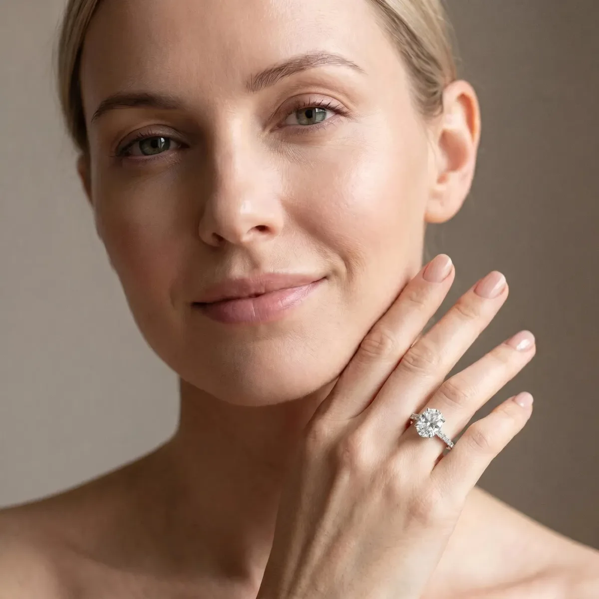 Oval Cut Diamond Solitaire Ring with Round Pavé Band and Four-Prong Setting Silver