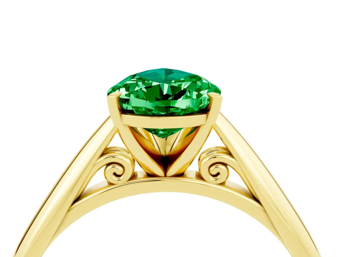 Pear Cut Emerald Solitaire Engagement Ring with Cathedral Setting and Four-Prong Mount Yellow gold