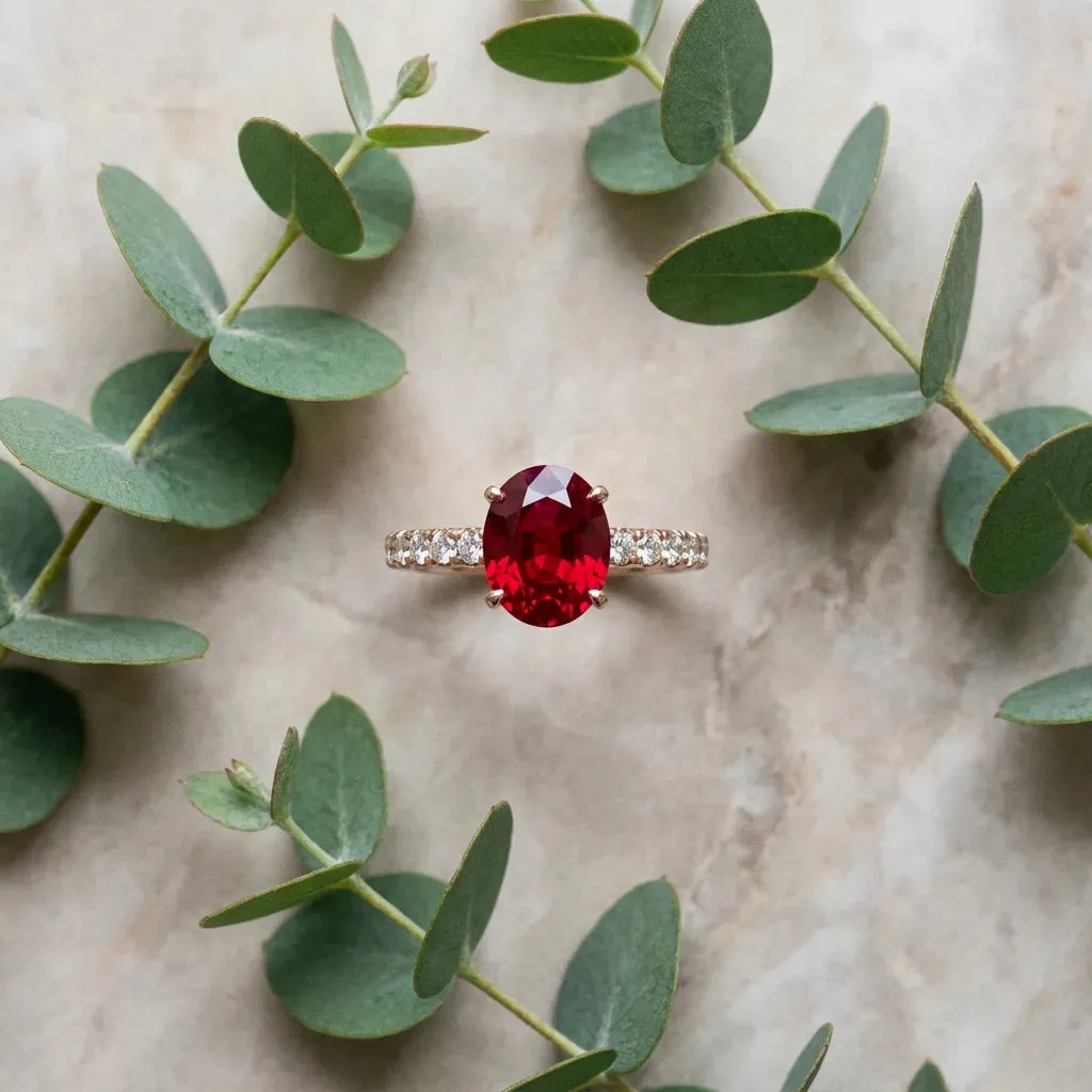 Oval Cut Ruby Solitaire Ring with Round Pavé Band and Four-Prong Setting Rose gold