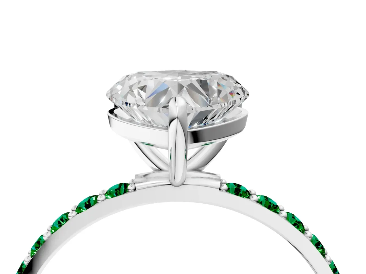 Heart Cut Diamond Solitaire Ring with Round Emerald Pavé Band and Prong Setting Silver