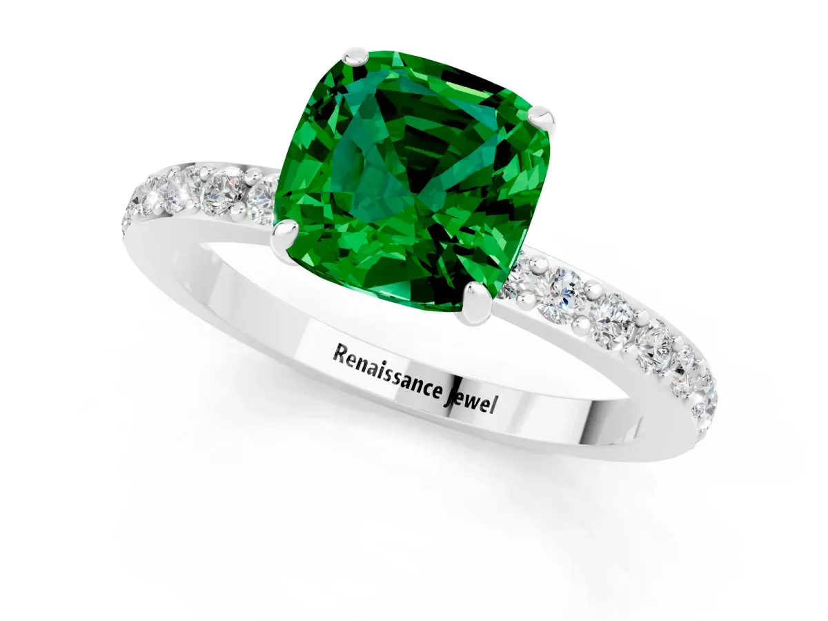 Cushion Cut Emerald Solitaire Engagement Ring with Pavé Band and Four-Prong Setting Silver