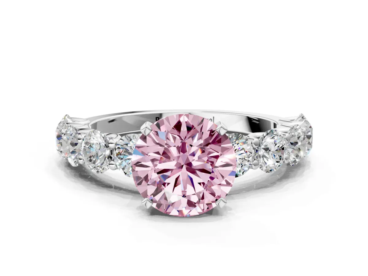 Fancy Pink Round Cut Diamond Prong Setting with Side Stones on a Pave Band Silver