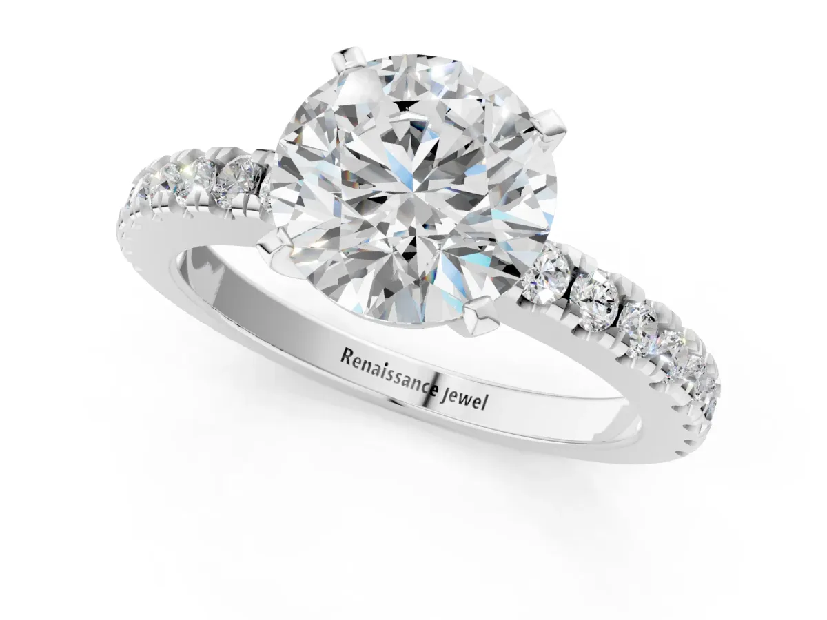Round Cut Solitaire Diamond with Pavé Band and Four-Prong Setting Platinum