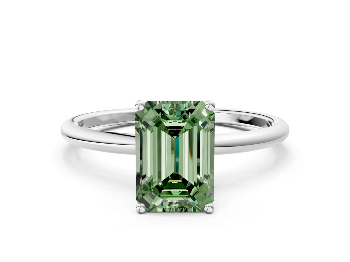 Fancy Green Emerald Cut Cut Solitaire Engagement Ring with Thin Band and Four-Prong Setting Silver