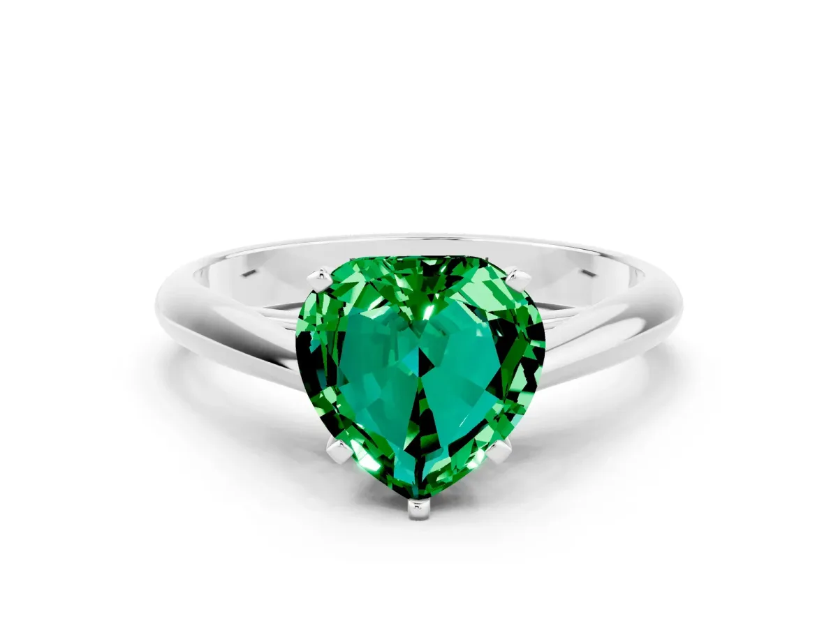Heart Cut Emerald Solitaire Engagement Ring with Cathedral Setting and Four-Prong Mount White gold