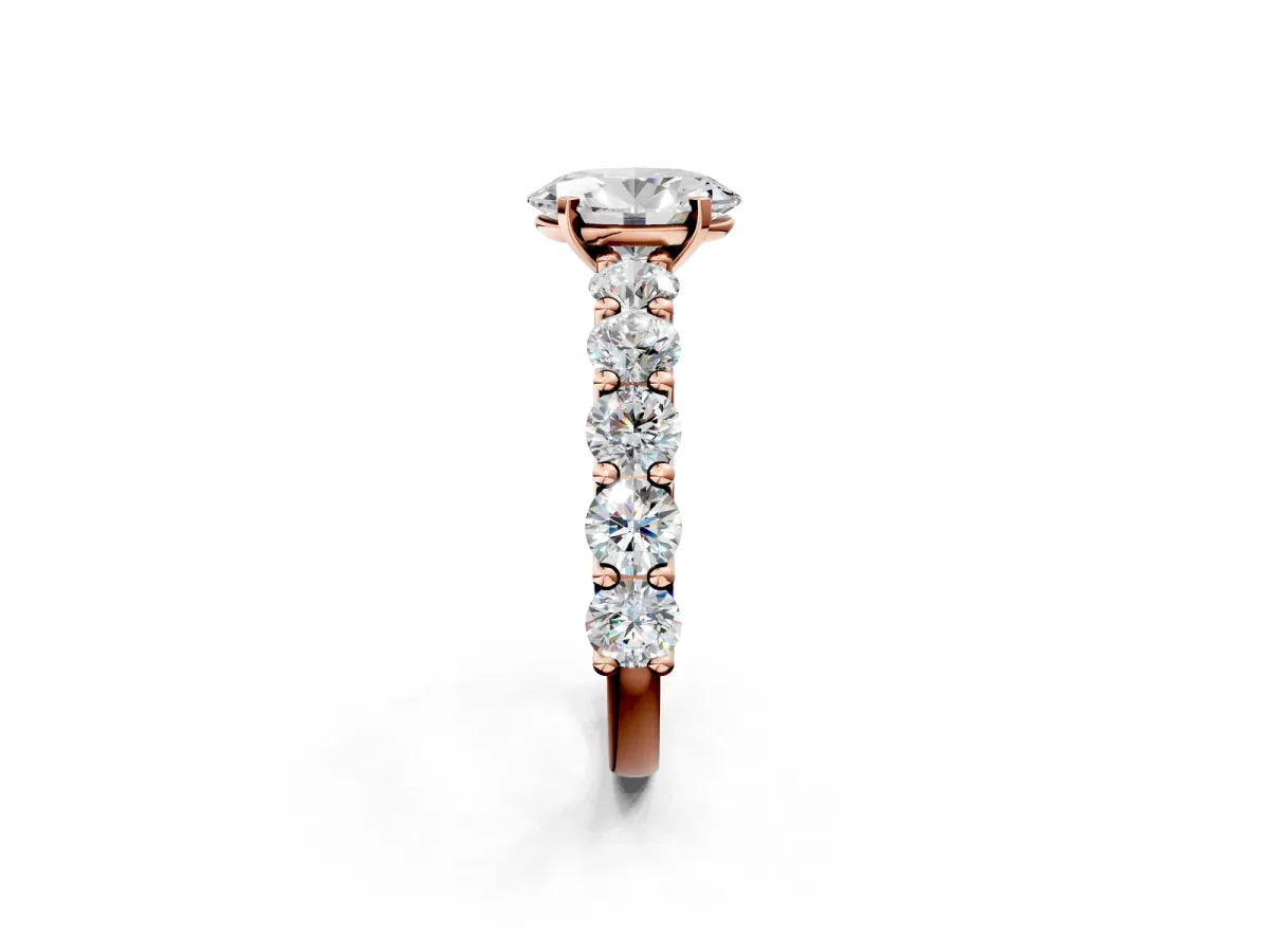 Oval Cut Diamond Prong Setting with Side Stones on a Pave Band Rose gold