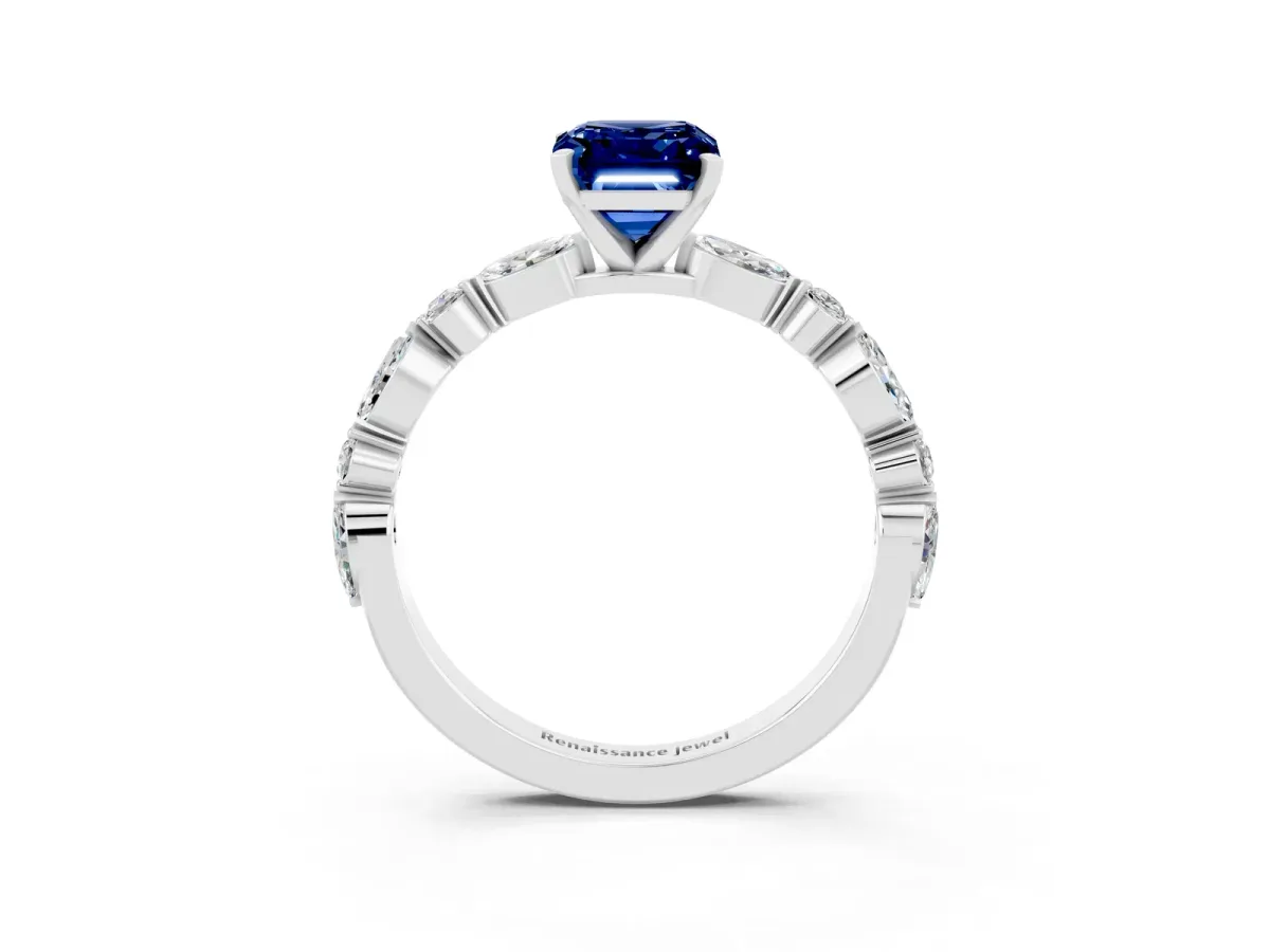 Emerald Cut Blue Sapphire Ring with Marquise and Round Side Stones and Four-Prong Setting Silver