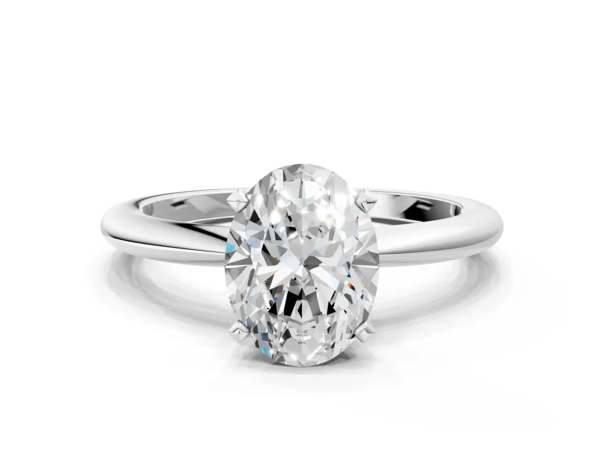 Oval Cut Diamond Solitaire Ring with Six-Prong Setting and Classic Band Platinum