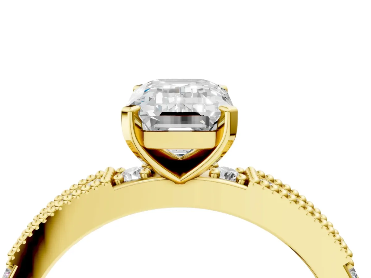 Emerald Cut Solitaire with Pavé Band and Four-Prong Setting Yellow gold