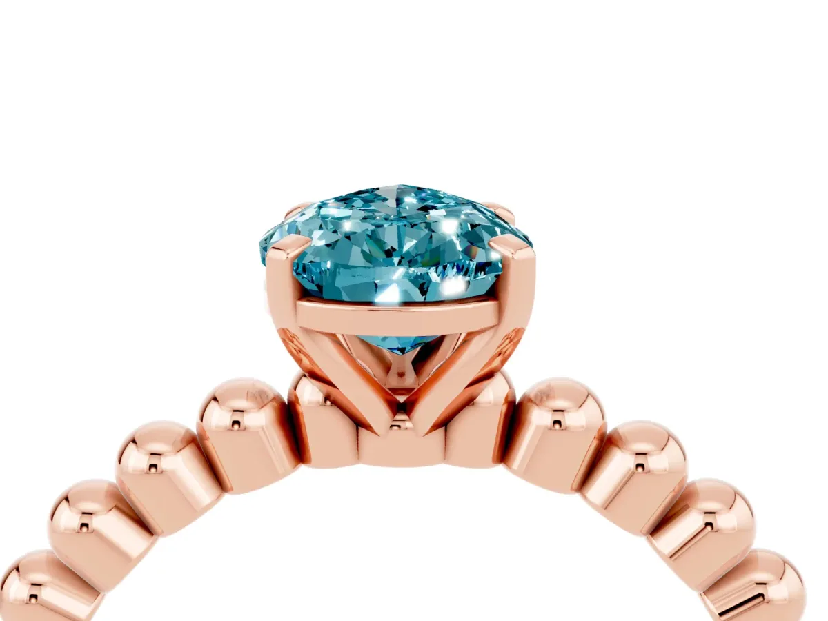 Pear Cut Blue Topaz Solitaire Ring with Beaded Band and Prong Setting Rose gold