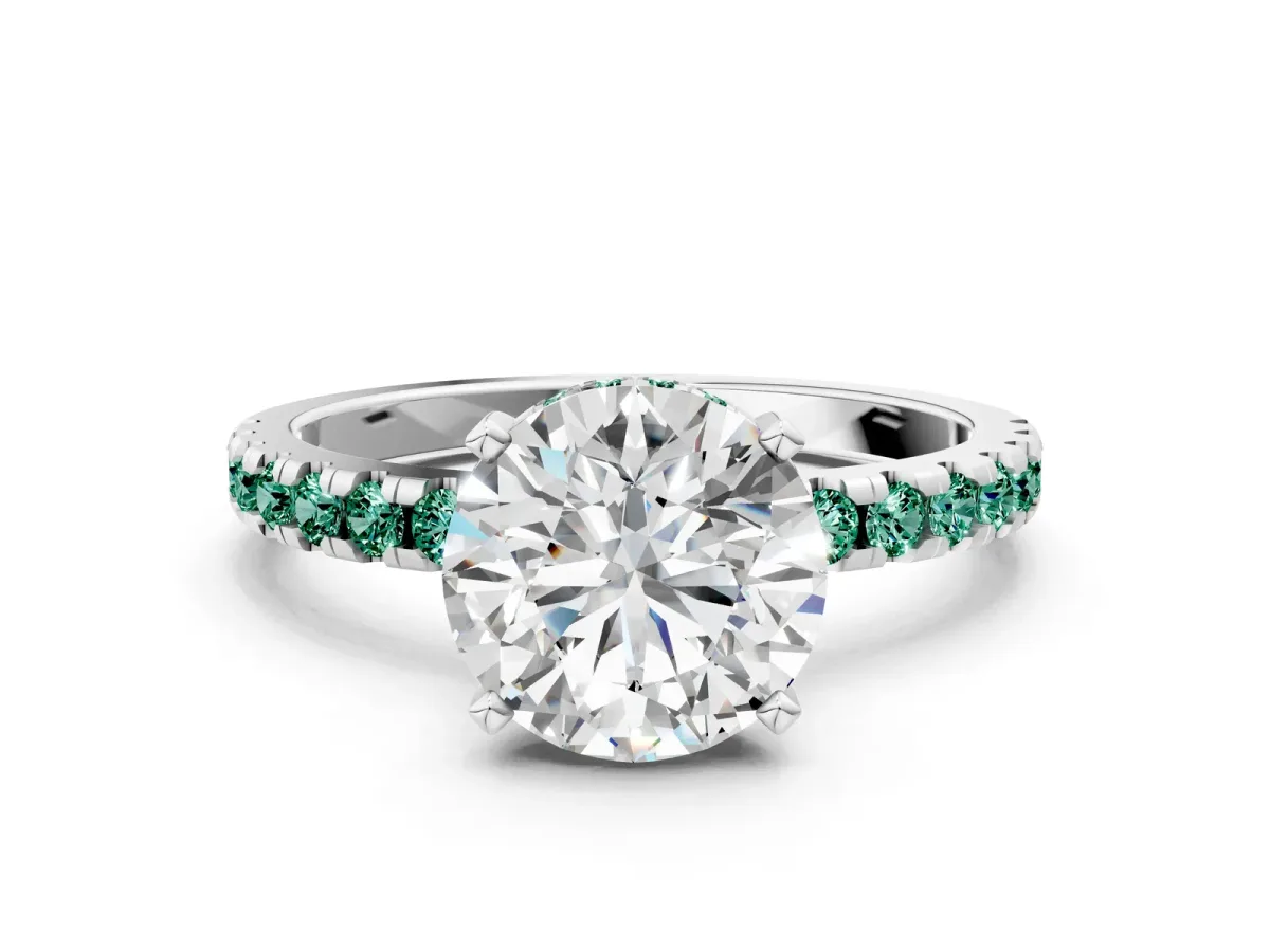 Round Cut Diamond Solitaire Ring with Round Tanzanite Pavé Band and Four-Prong Setting Silver