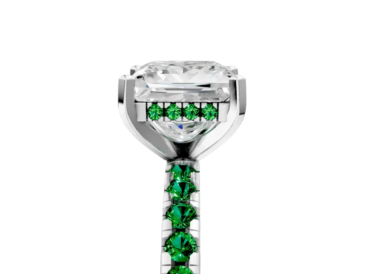 Princess Cut Diamond Solitaire Ring with Round Emerald Pavé Band and Four-Prong Setting Silver