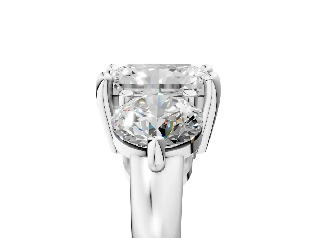 Three-Stone Radiant Cut Brilliant Cut Solitaire Ring with Prong Setting on a Classic Band Platinum