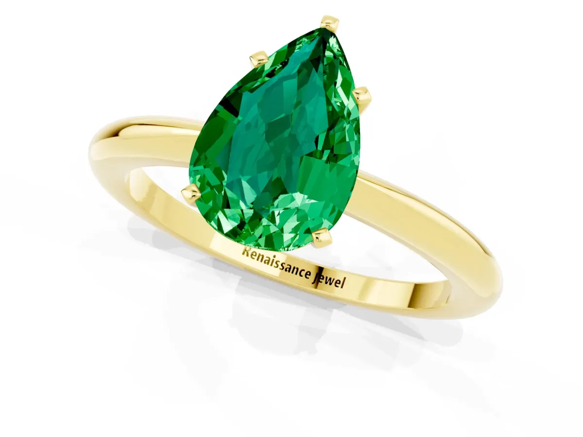Pear Cut Emerald Solitaire Ring with Six-Prong Setting and Classic Band Yellow gold