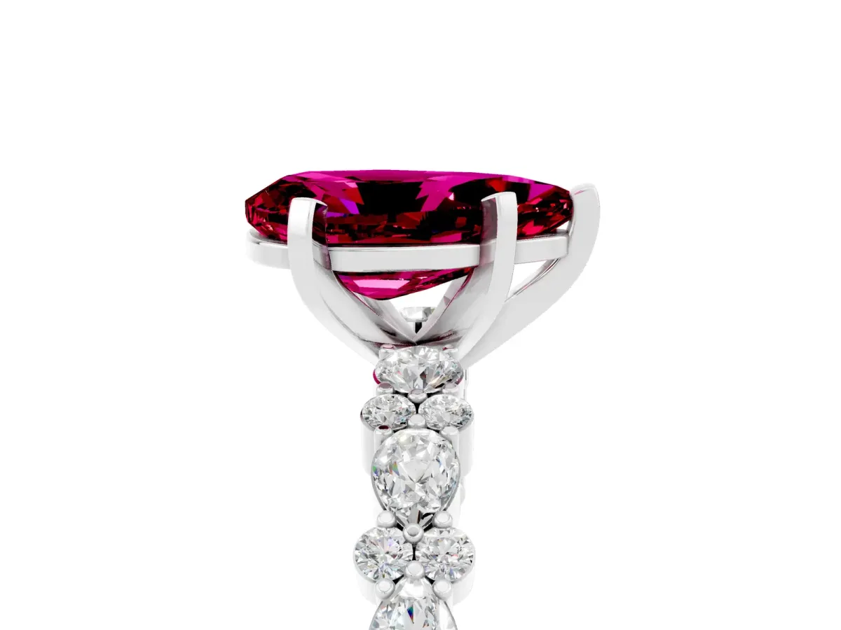 Pear Cut Garnet Side Stone Solitaire Ring with Round and Four-Prong Setting White gold