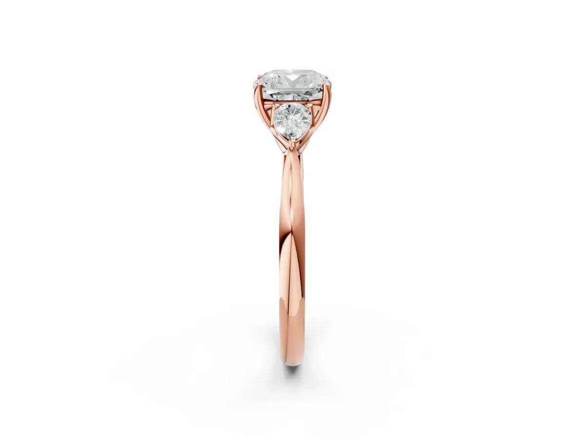 Cushion Cut Diamond Three-Stone Ring with Pear Side Stones and Prong Setting Rose gold