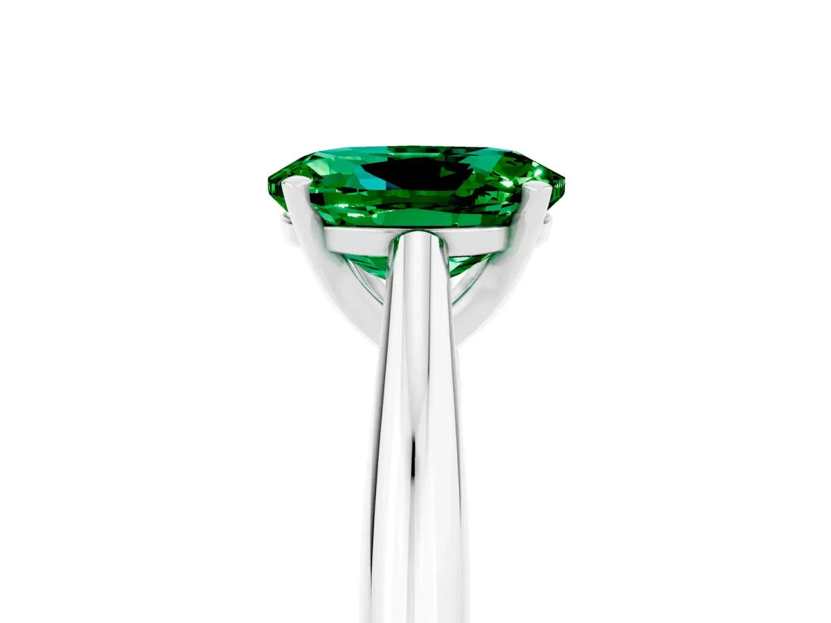 Oval Cut Emerald Solitaire Engagement Ring with Cathedral Setting and Four-Prong Mount White gold