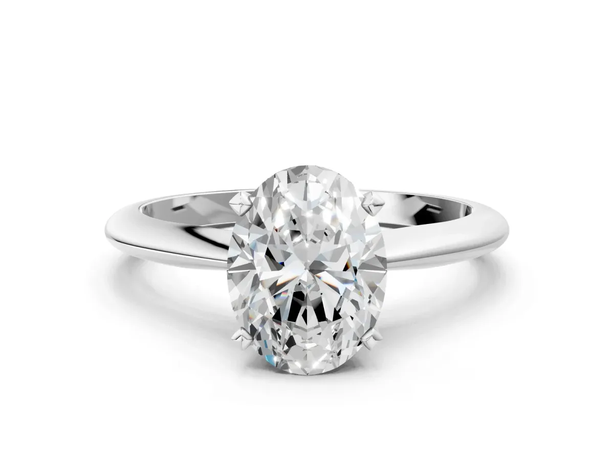 Oval Cut Diamond Solitaire Engagement Ring with Classic Band and Four-Prong Setting Silver